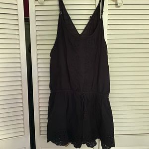 Black romper with eyelet details, size medium